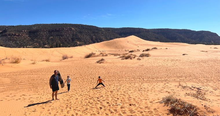 Sandboarding with Kids at Coral Pink Sand Dunes State Park in Utah