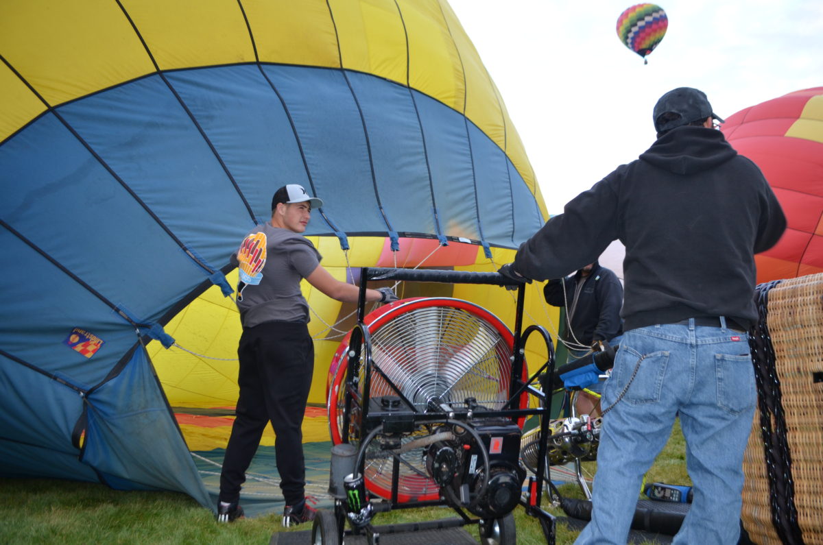 Volunteers filling a hot air balloon at the Albuquerque International Balloon Fiesta.