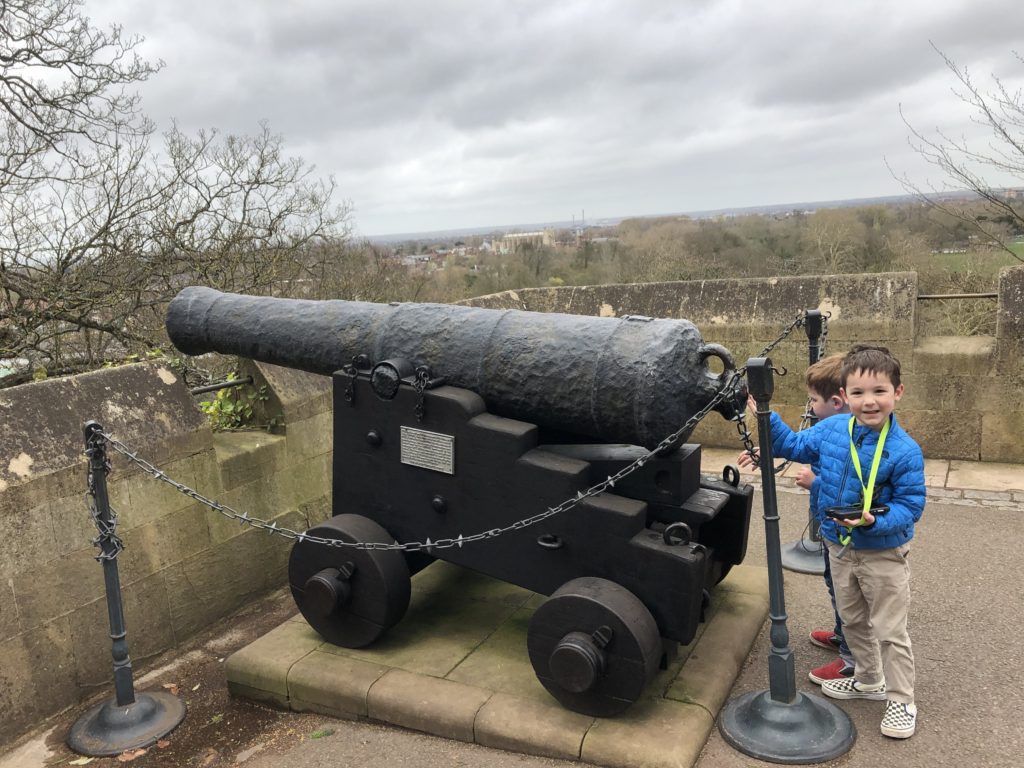 Artillery lines the Windsor Castle - Exploring Through Life - Visit the gorgeous Windsor Castle for a quiet escape from the city of London. Tour the chapel where Prince Harry and Meghan Markle were read and experience a surprisingly kid-friendly excursion at the Queen's weekend residence. Windsor is the perfect day trip from London.