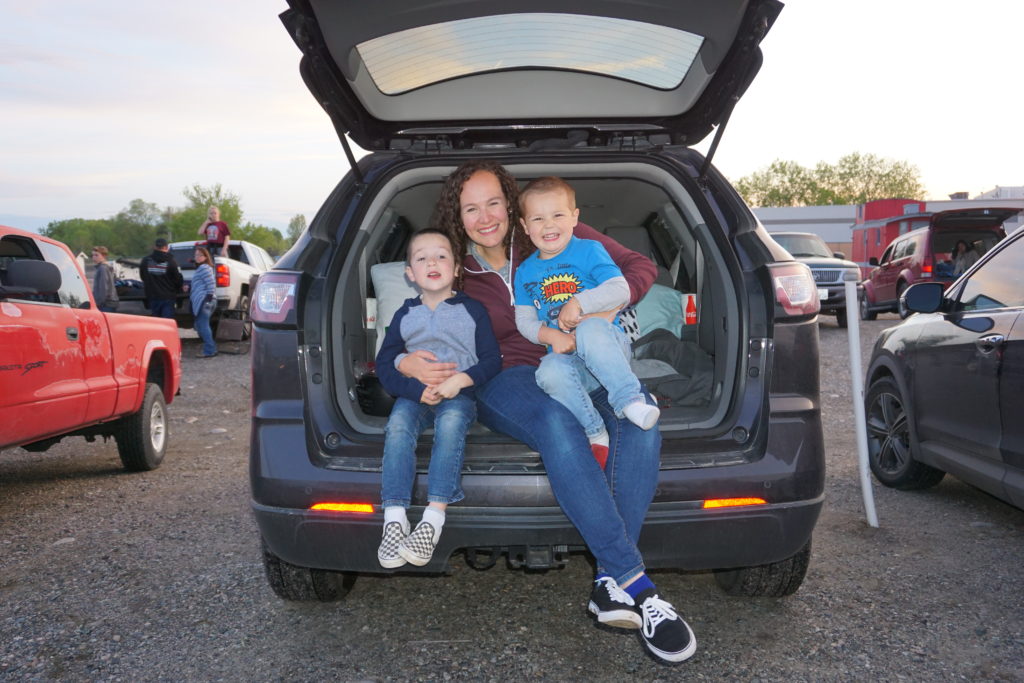 Mom and kids in the back of the car for the drive-in movie - Drive-In Movie Tips - Exploring Through Life