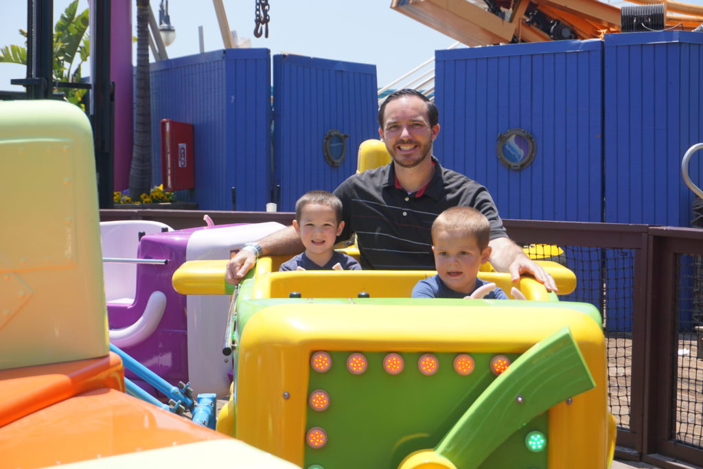 Family on a ride at Pacific Park - Santa Monica Pier for Families - Exploring Through Life