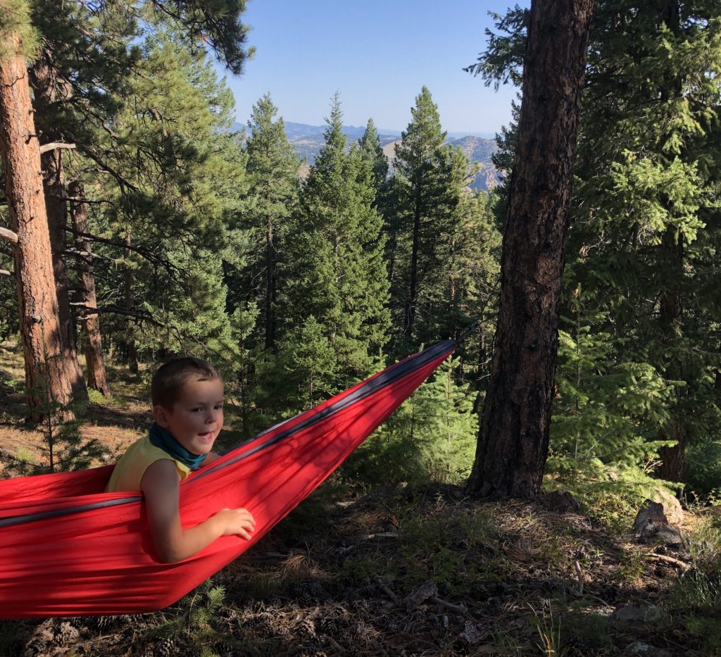 Bringing hammocks makes for a relaxing break during your hike - games and activities for kids on a hike - exploring through life