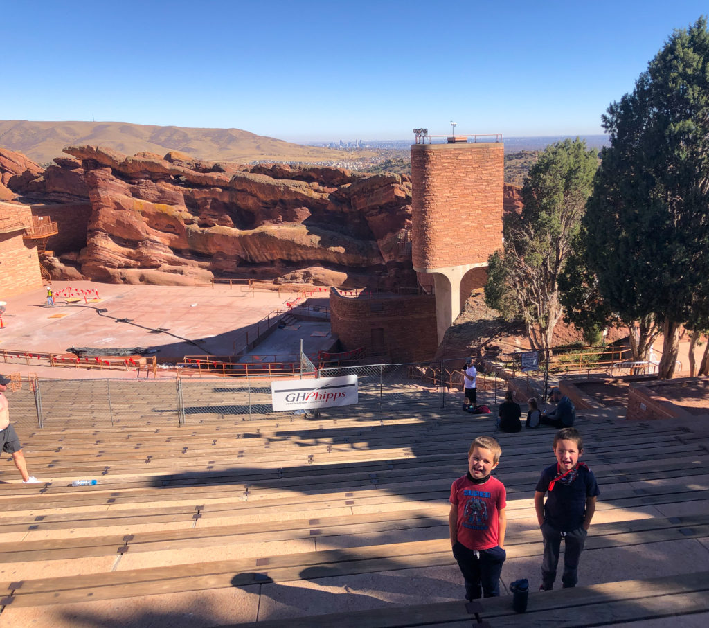 Red Rocks Amphitheatre is a great place to take kids in Denver. You can see the venue and great views of downtown Denver. - Exploring Through Life
