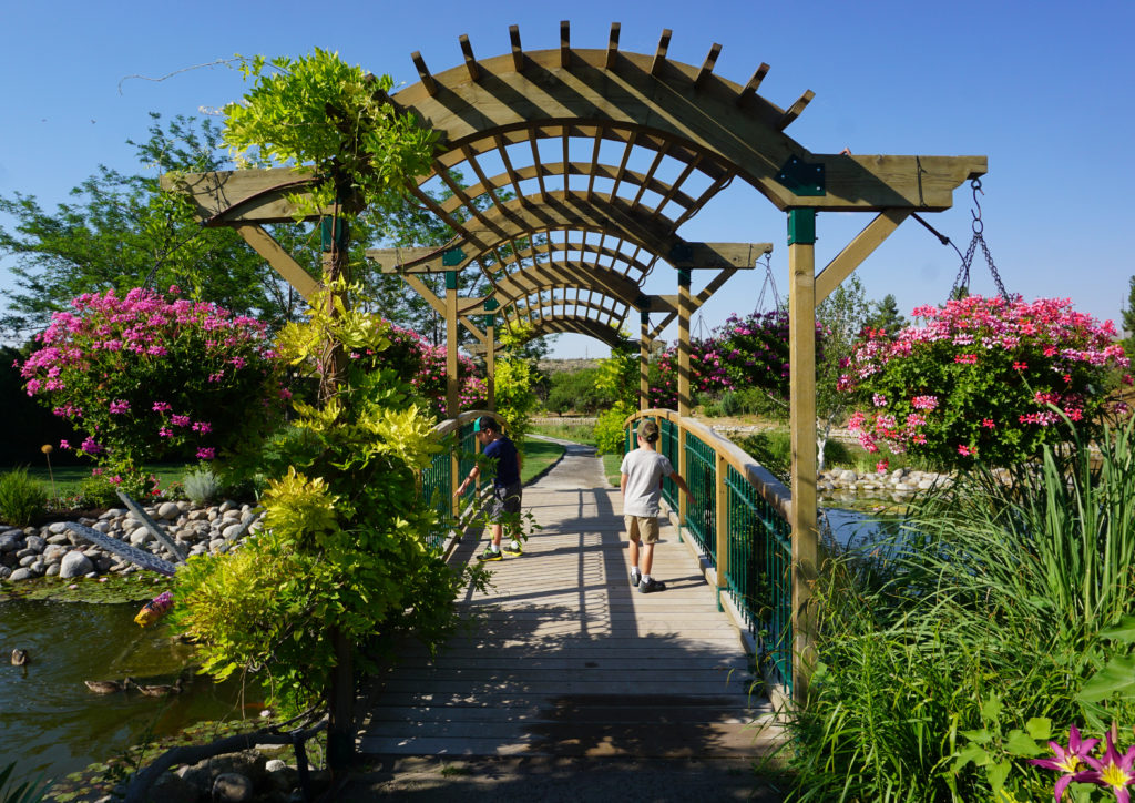 Monet Lake at Ashton Gardens feature beautiful bridges and trellis. Kids will love visiting this garden at Thanksgiving Point.
